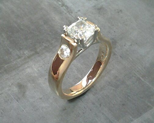 custom design 14k gold engagement ring with princess cut diamond and round cut accent diamonds