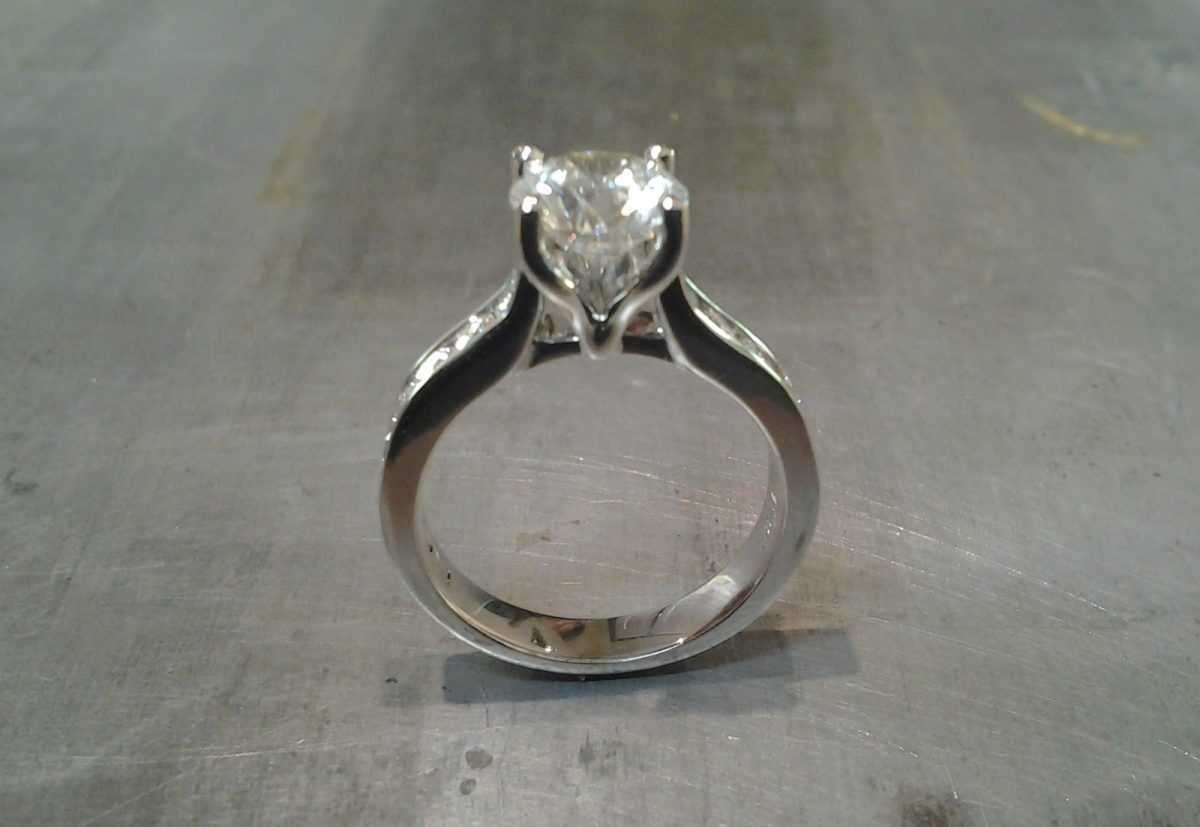 14k white gold engagement ring with princess cut diamond in cathedral setting