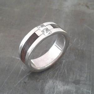 custom white gold wedding ring with wood inlay and center diamond