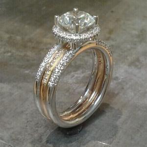 triple band delicate engagement ring white gold and gold with custom engraving and princess cut diamond in halo setting