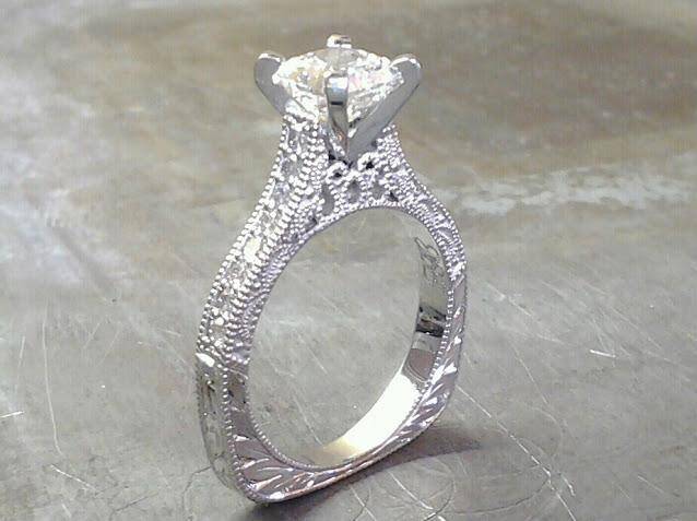 white custom filigree engagement ring with princess diamond in channel setting