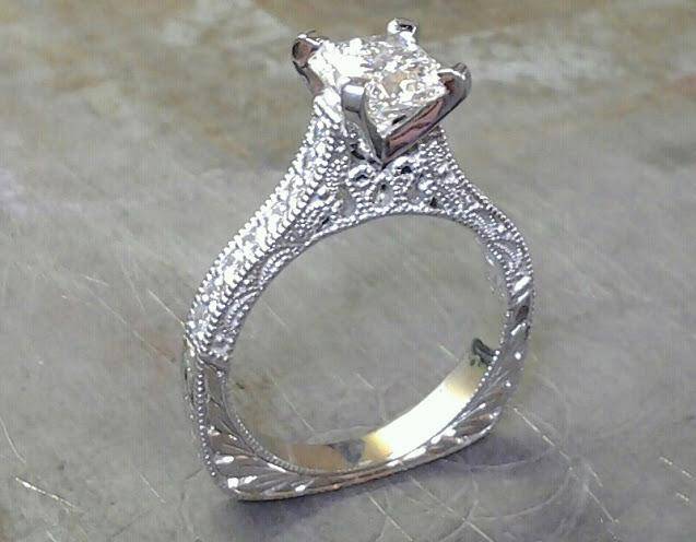 white custom filigree engagement ring with princess diamond in channel setting front view