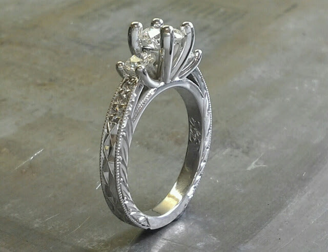 custom filigree white gold band with leaf accents and a triple cathedral set of diamonds with matching diamond band side view