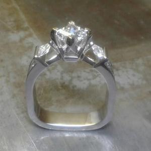 square shaped ring with triple set diamonds
