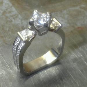 square shaped ring with triple set diamonds top view
