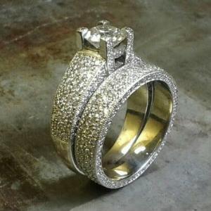 custom engraved engagement ring with princess diamond in channel setting and matching wedding band
