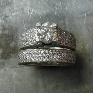 custom engraved engagement ring with princess diamond in channel setting and matching wedding band top view