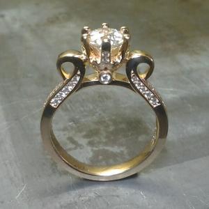 victorian style gold engagement rings with diamond band, princess cut center diamond in a cathedral setting and small accent diamonds