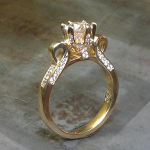 victorian style gold engagement rings with diamond band, princess cut center diamond in a cathedral setting and small accent diamonds side view