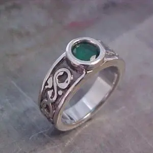 rustic custom engraved ring with emerald
