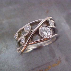 custom swirl wedding ring with round diamonds
