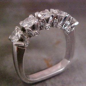 custom wedding ring with multiple diamond cluster
