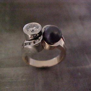 custom ring with white gold and black pearl