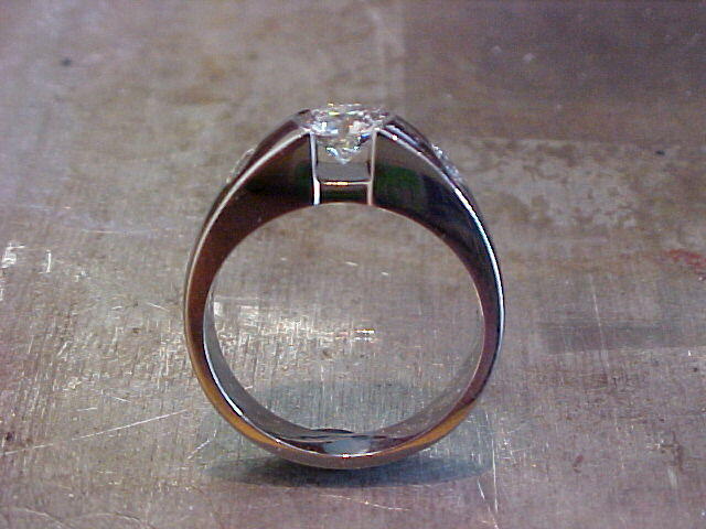 floating diamond in white gold engagement ring