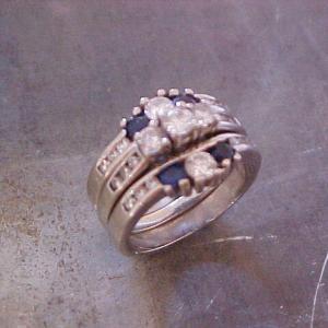 custom ring with blue sapphires and diamonds in channel setting