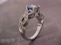 Criss cross engagement ring