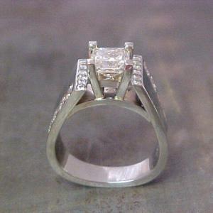 engagement ring with thick band and princess cut diamond