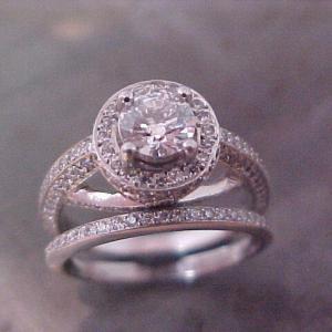 split diamond band engagement ring with round center diamond designed by sean ferguson