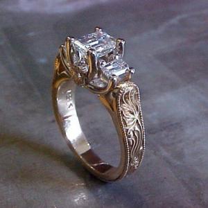 intricate art deco engagement ring with princess cut diamonds
