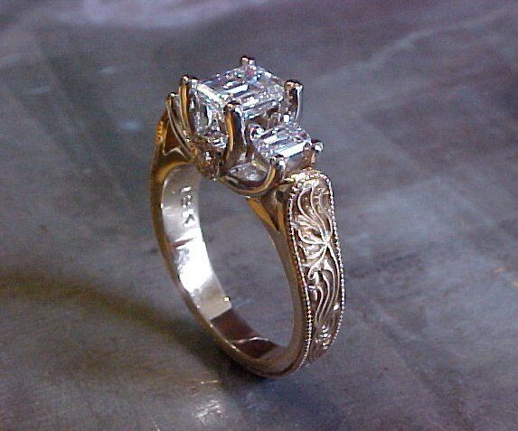 intricate art deco engagement ring with princess cut diamonds
