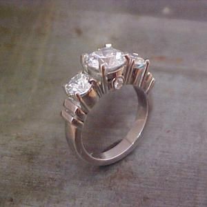 custom engagement ring in 14k white gold with three large diamonds