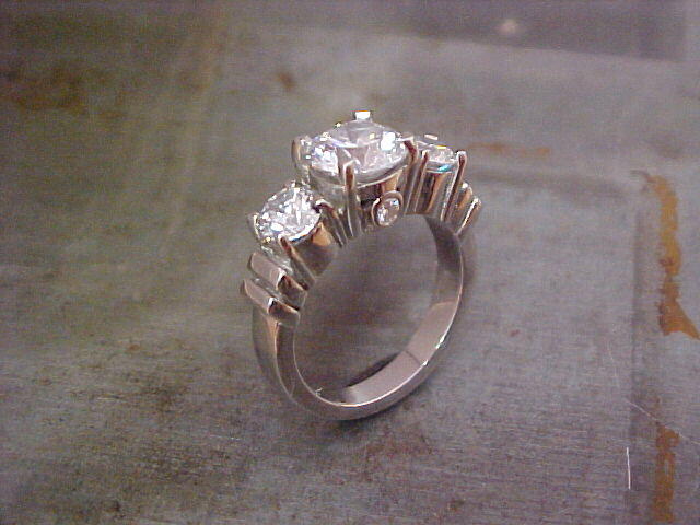 custom engagement ring in 14k white gold with three large diamonds