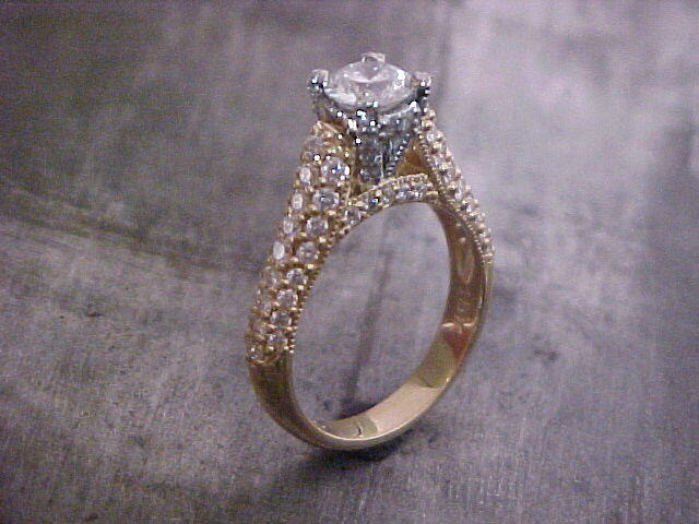 custom engagement ring with diamond encrusted band and custom engraving