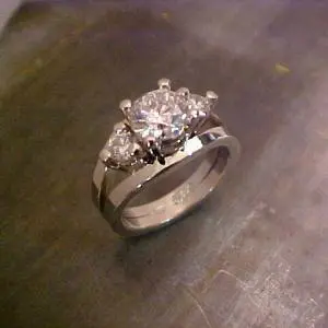 custom 14k white gold ring with triple diamond setting