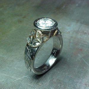 custom medieval inspired celtic ring with large diamond in circular setting