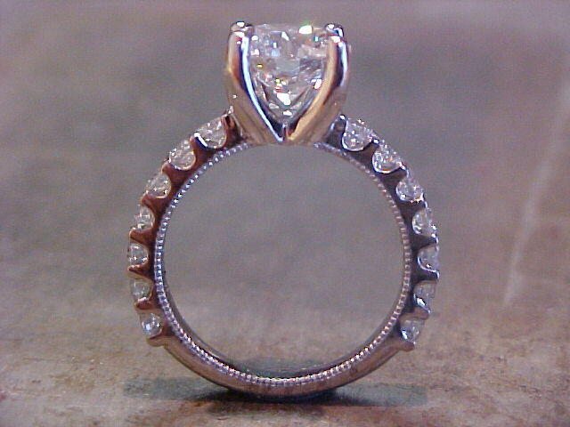 custom engagement ring with diamond band and large round diamond side view