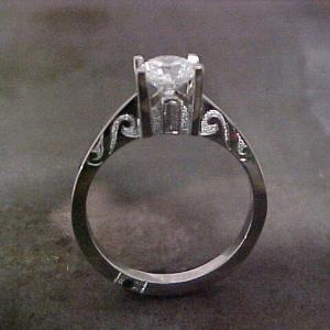 custom engagement ring with engraving and princess cut tension set diamond