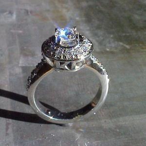 14k white gold custom engagement ring with custom monogram engraving and halo setting