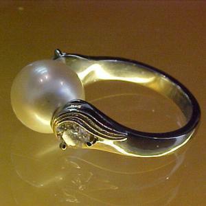 custom ring with large floating pearl