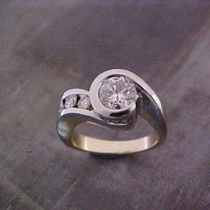 custom assymetrical ring with large center diamond