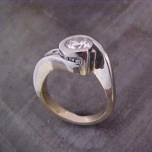 custom assymetrical ring with large center diamond top view