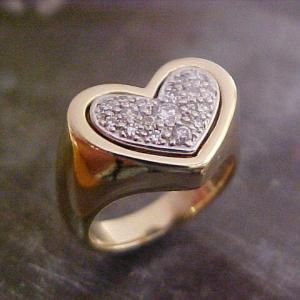 gold heart ring with diamonds and white gold