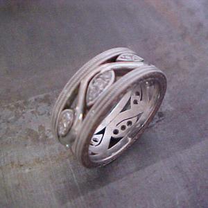 custom engraved white gold wedding band with vine design