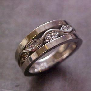 custom wedding ring with wave engraving and diamonds