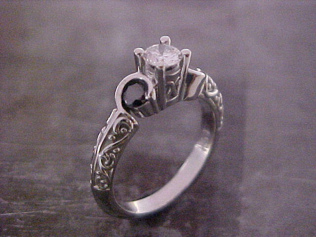 custom designed engagement rings with black diamonds and round center diamond
