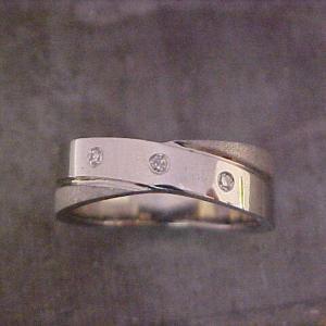 custom textured wedding ring with diamond accents