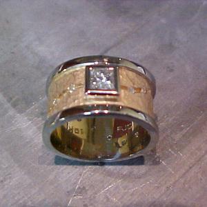 custom wide band with engraving and square set diamond