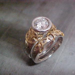 custom engraved engagement ring and celtic wedding band with large round solitaire diamond