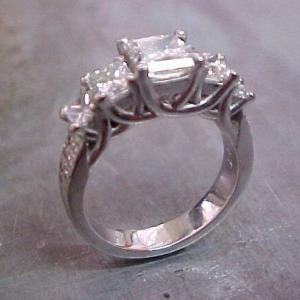white gold custom engagement ring with diamond cluster