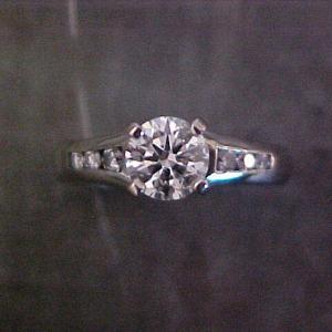 custom solitaire engagement ring with side accents