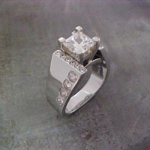 custom engagement ring with side accents and large center diamond