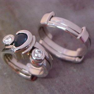 matching custom wedding rings with sapphire accent