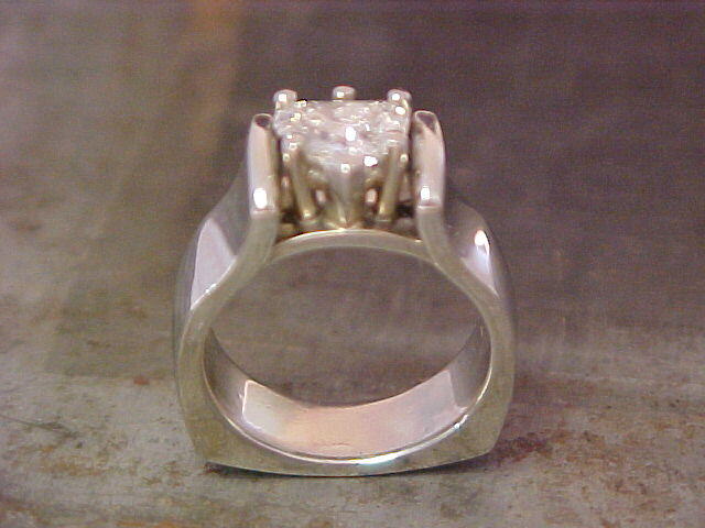 custom solitaire engagement ring