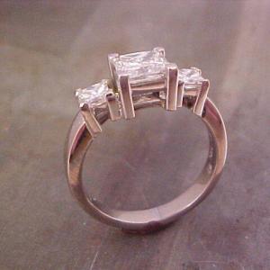 custom three stone engagement ring