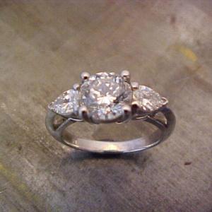 custom three stone engagement ring