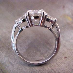 custom three stone engagement ring side view